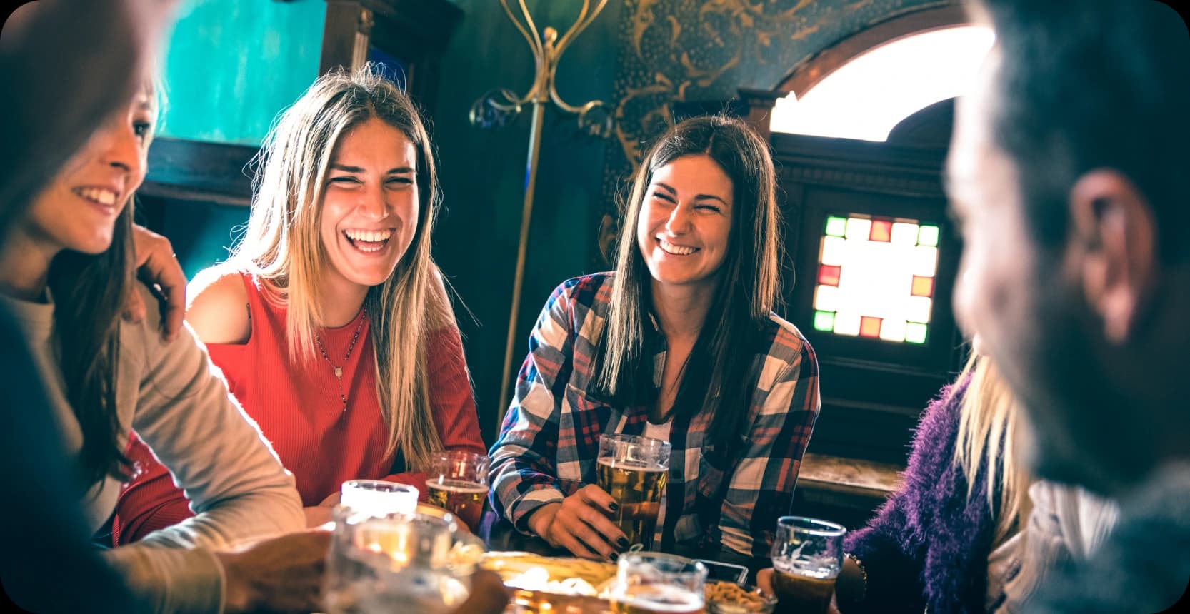 people laughing with beer and having fun people laughing with beer and having fun